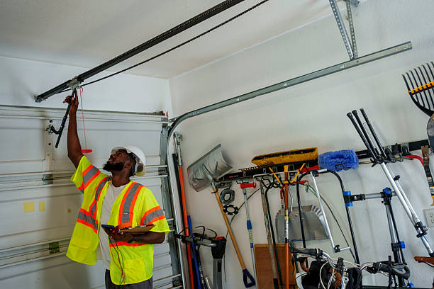 Professional Garage Door Panel Replacement technician working in Richfield Springs, NY